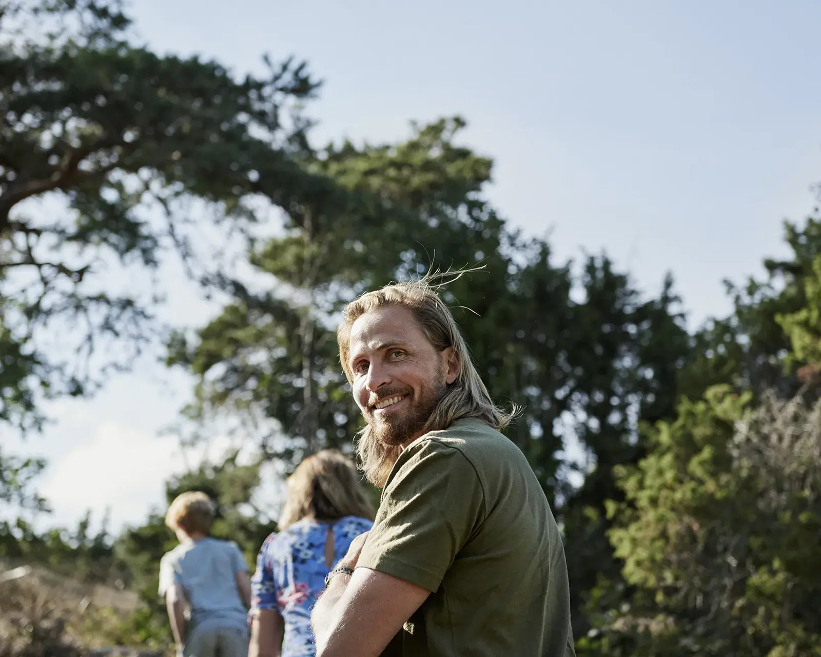 a man enjoying the outdoors with his family